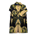 Black and yellow patterned coat on a white background