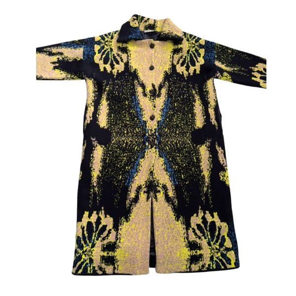 Patterned coat with black and yellow design on a white background