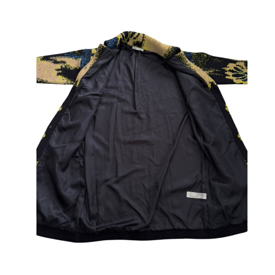 Black jacket lining with patterned sleeves on a white background