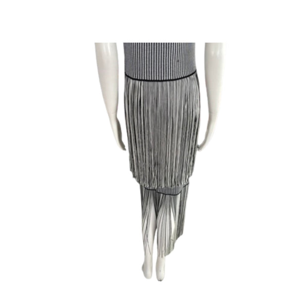 Mannequin wearing a gray pleated skirt on a white background
