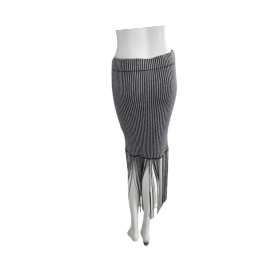 Grey ribbed skirt with sheer fringe on a white background