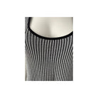 Black and white striped tank top on a mannequin with a plain background