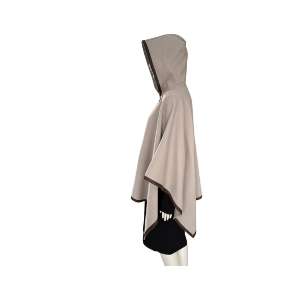 Beige hooded garment on a mannequin against a white background
