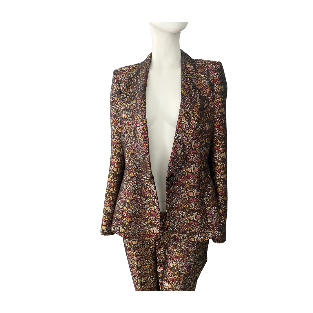 Floral patterned blazer on a mannequin against a white background