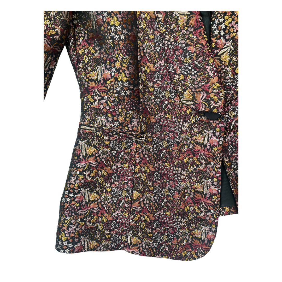 Floral patterned shirt with a collar on a white background
