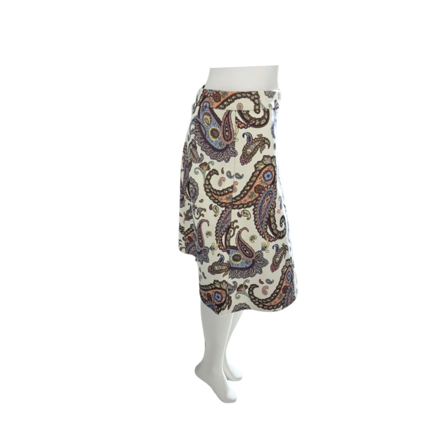Patterned skirt on a mannequin against a white background