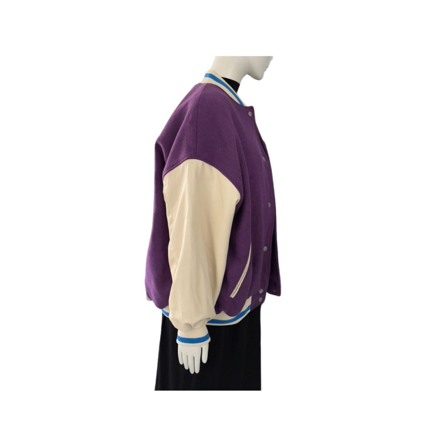 Purple and cream varsity jacket on a mannequin against a white background
